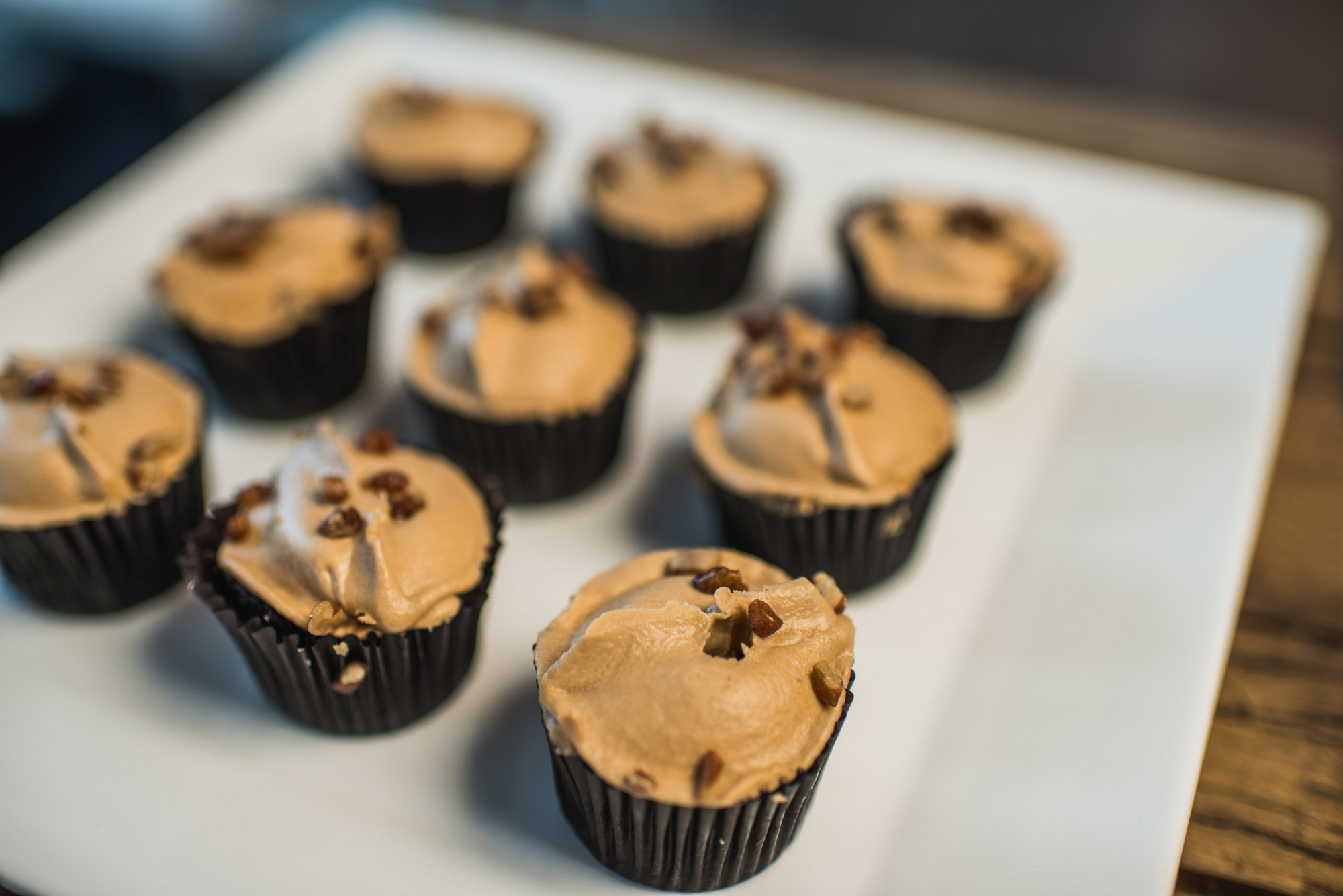 a tray of cupcakes